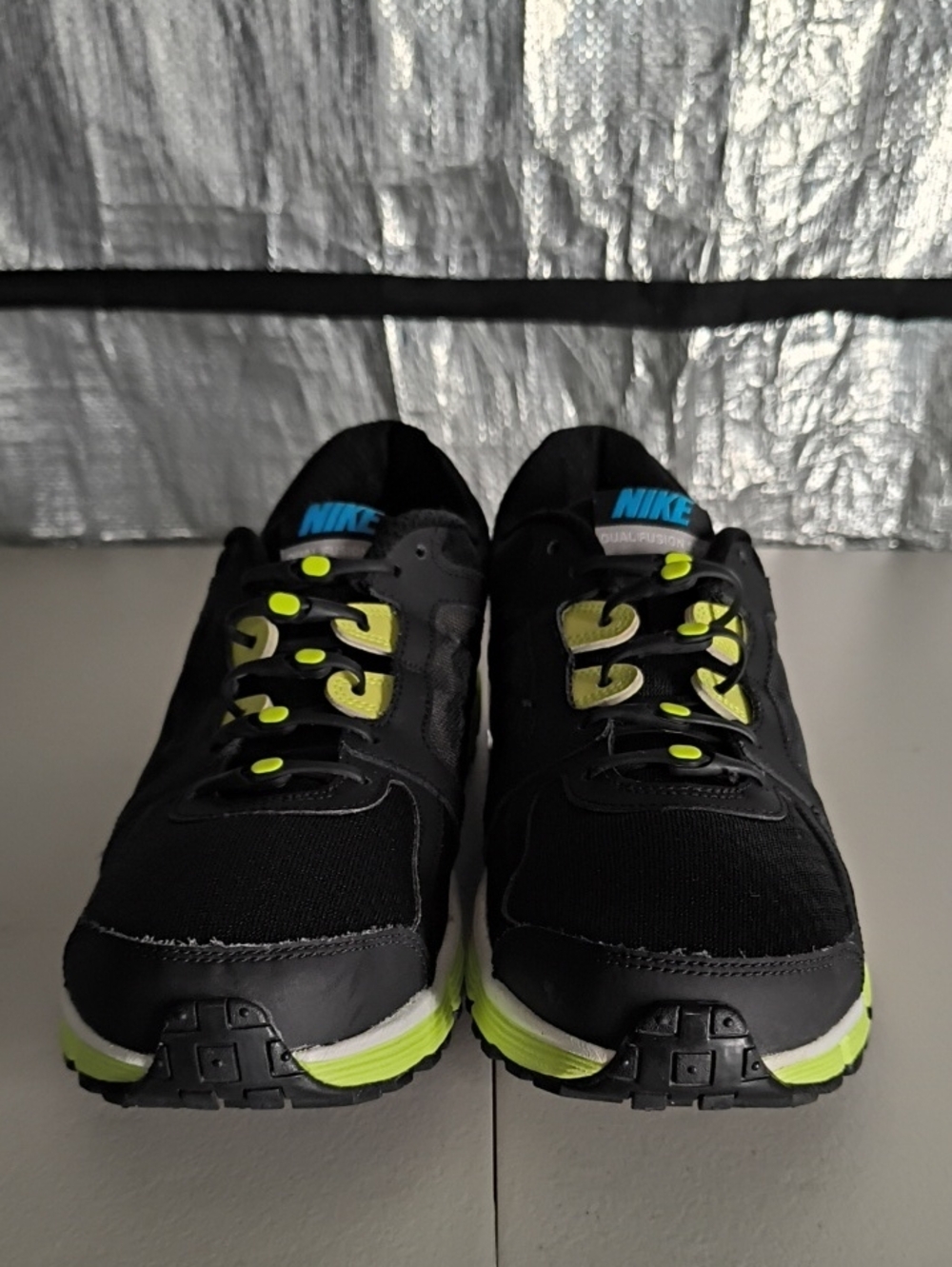 Nike Black Sneakers with Neon Yellow and Blue Accents